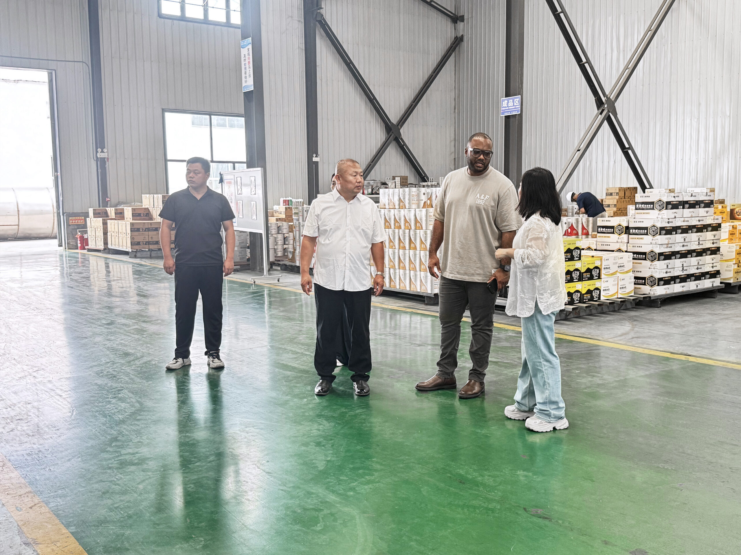 Customers inspecting lubricant production line at Feller factory Customers inspecting lubricant production line at Feller factory